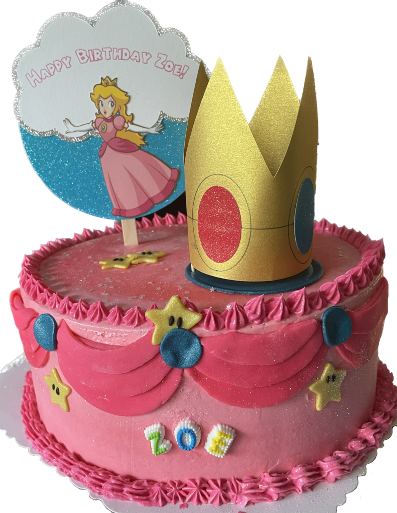 Pink Cake decorated to represent Princess Peach from Mario Bros